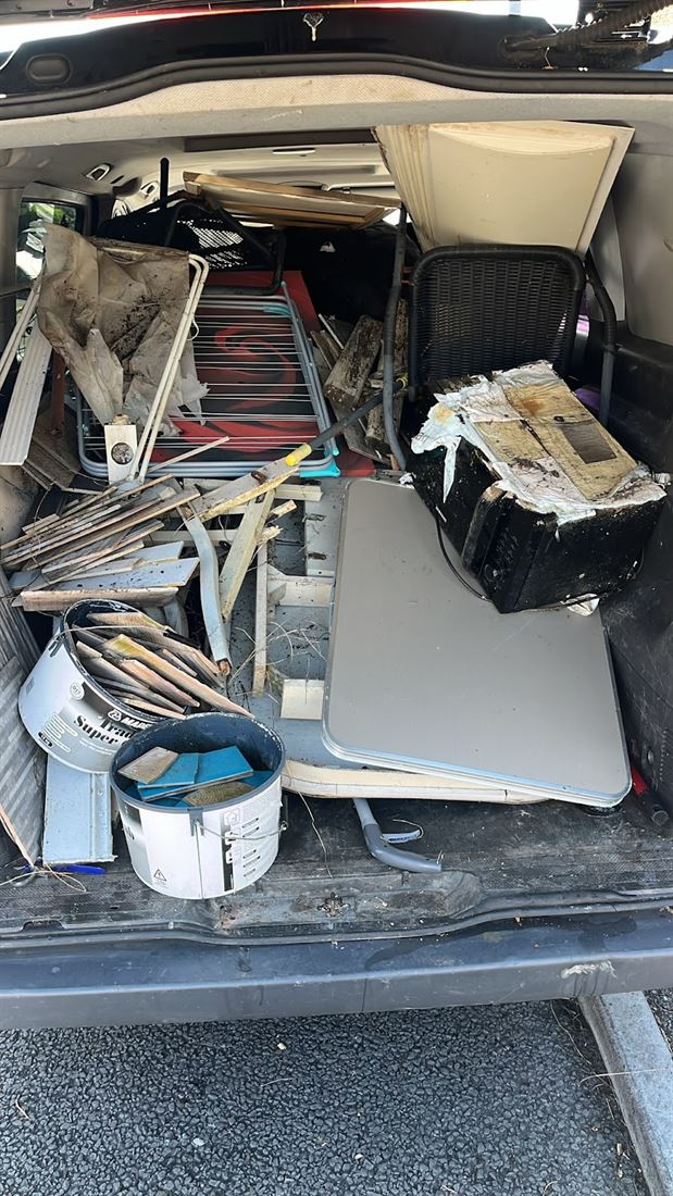 A van packed to the roof with a full house clearance